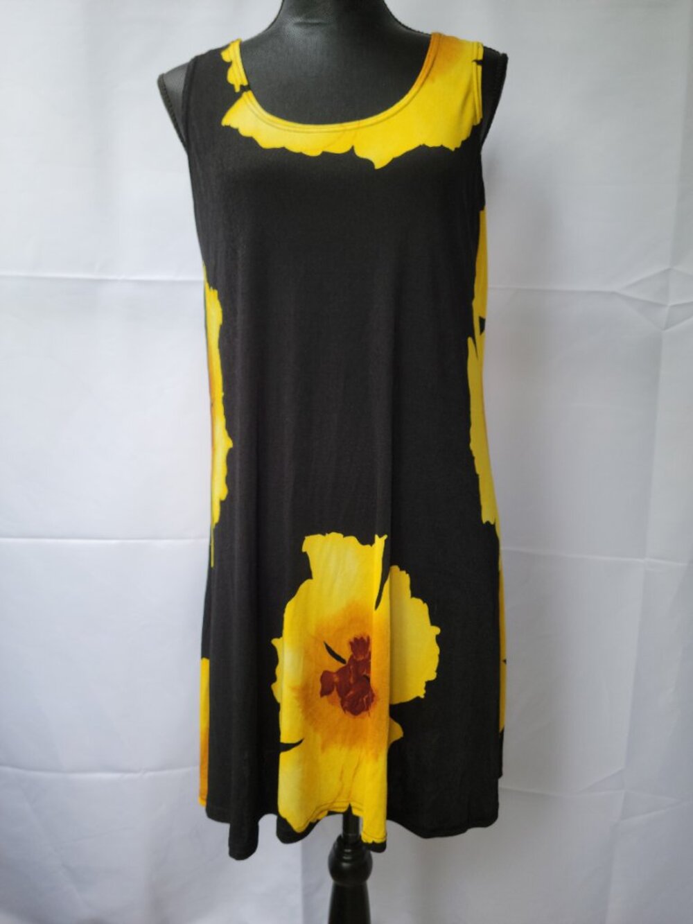 Comfortable , black and yellow beach dress in size medium or large.